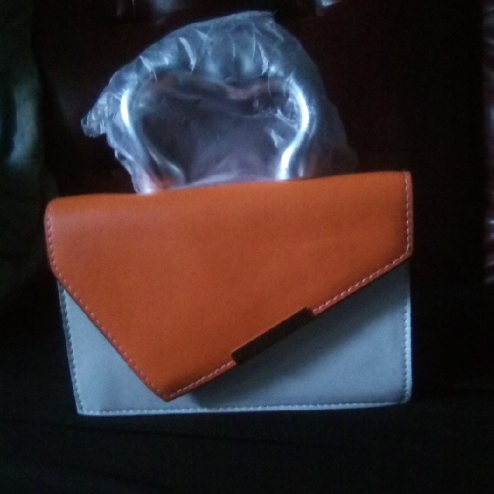 Orange and White Geometric Clutch with Modern Design